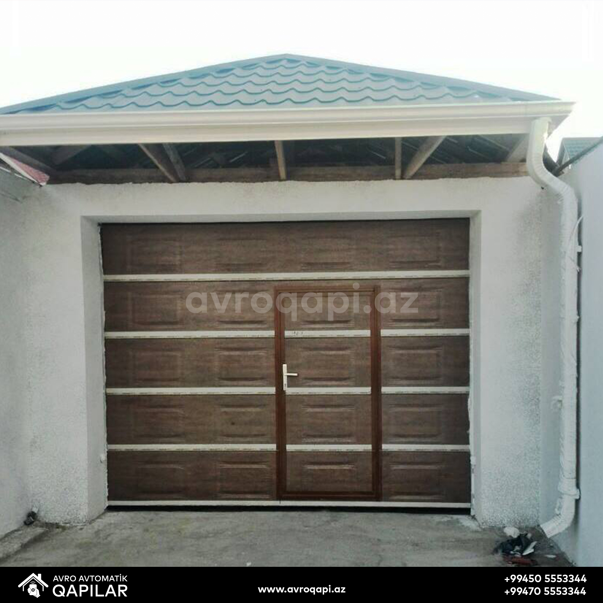 Avtomatik qaraj qapısı üzərinə yerləşdirilən əl qapısı. ( Bilgəh Qəsəbəsi )